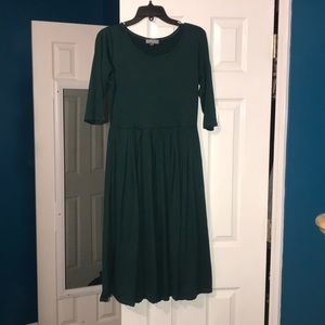 A dark green midi dress